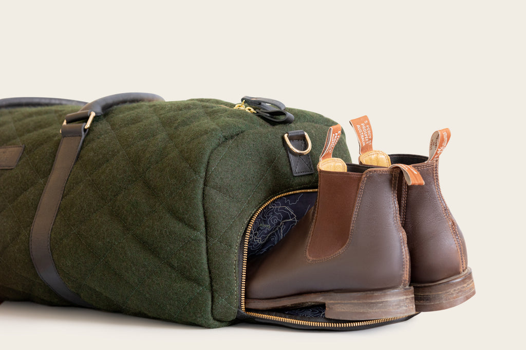 honest wolf green quilted weekender product shoe pocket