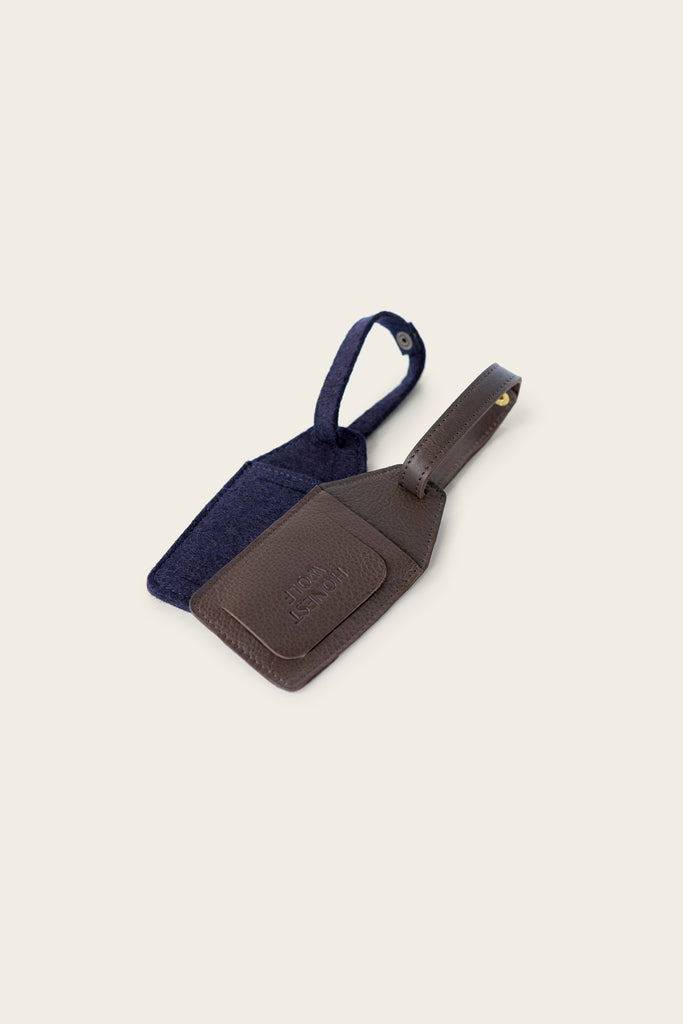 honest wolf navy wool felt and brown leather luggage tag product