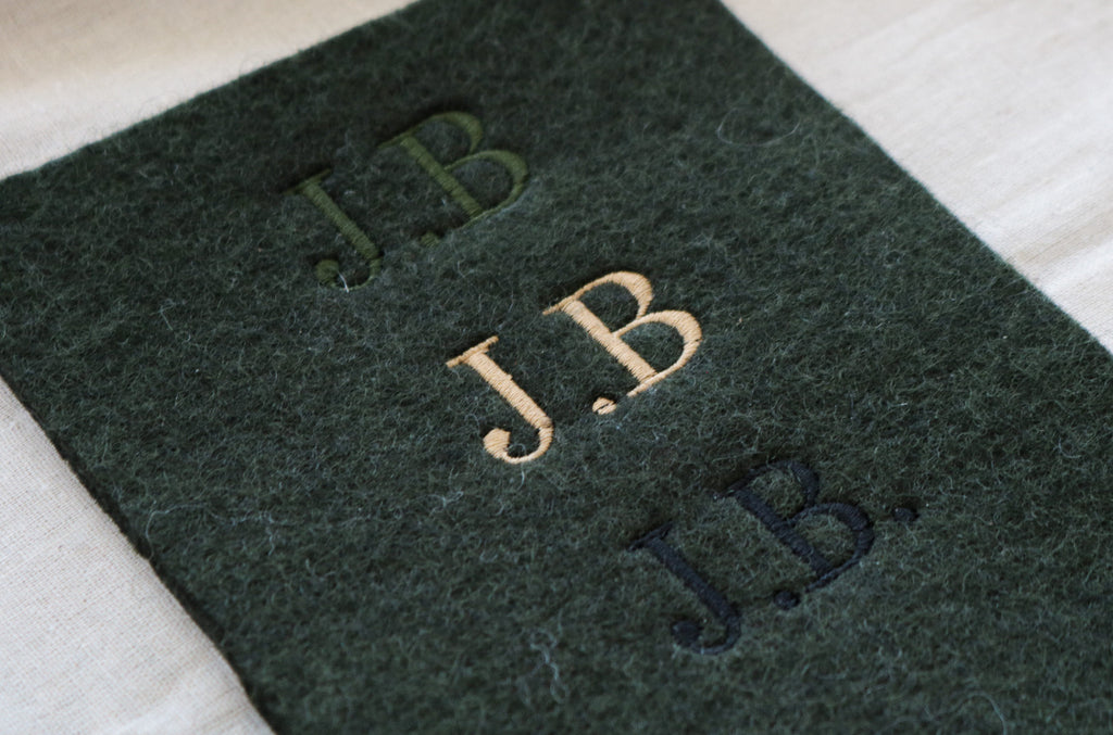 honest wolf green wool embroidery