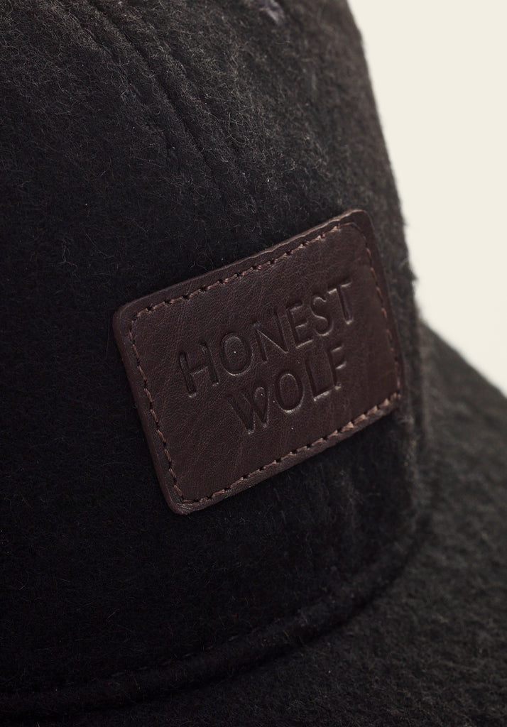 Honest Wolf black wool and brown leather legacy cap product 