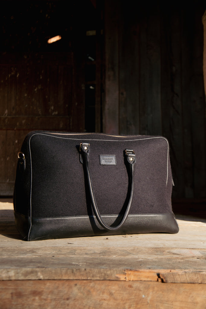 honest wolf black wool duffle overnight bag lifestyle