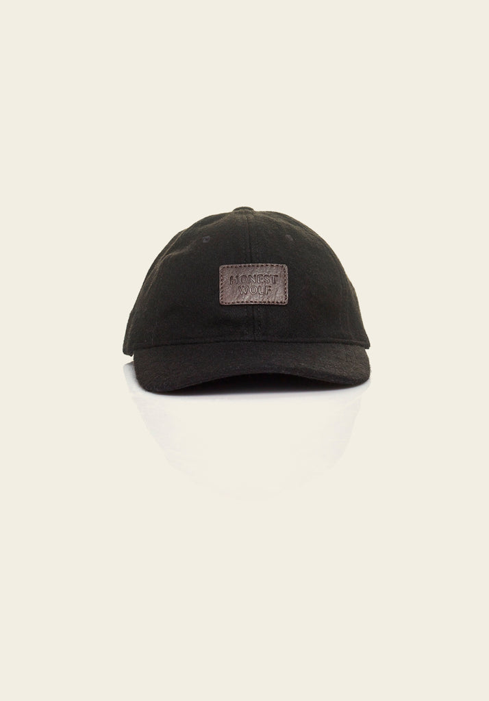 Honest Wolf black wool and brown leather legacy cap product 