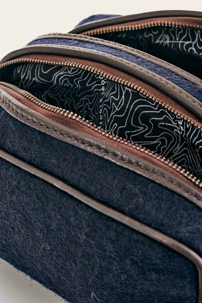 honest wolf wool wash bag navy with brown leather product
