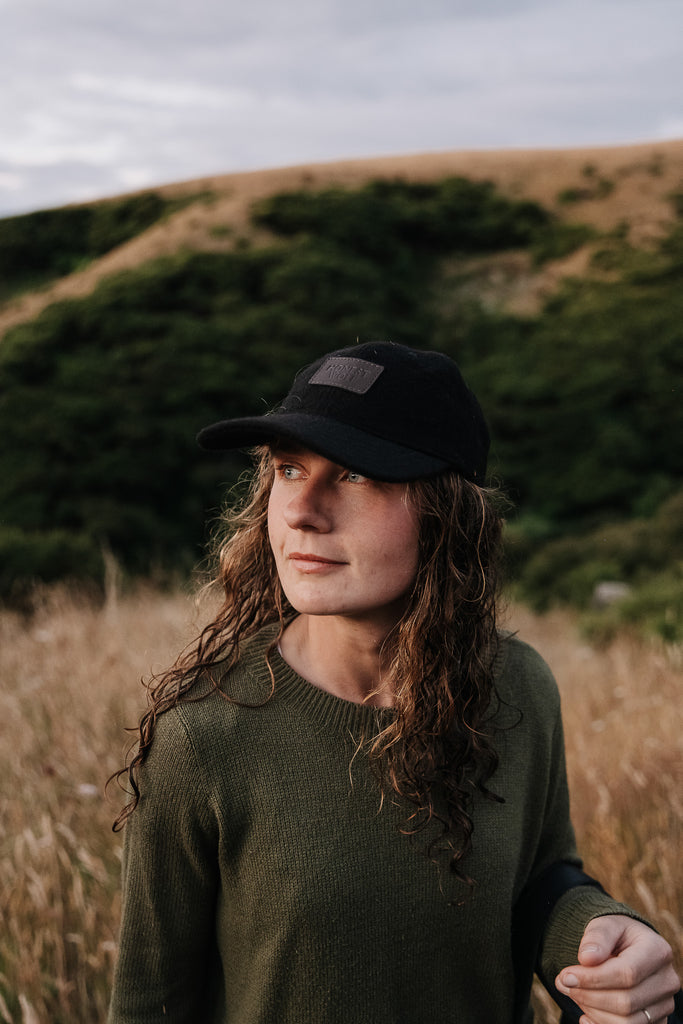 Honest Wolf black wool and brown leather legacy cap lifestyle 