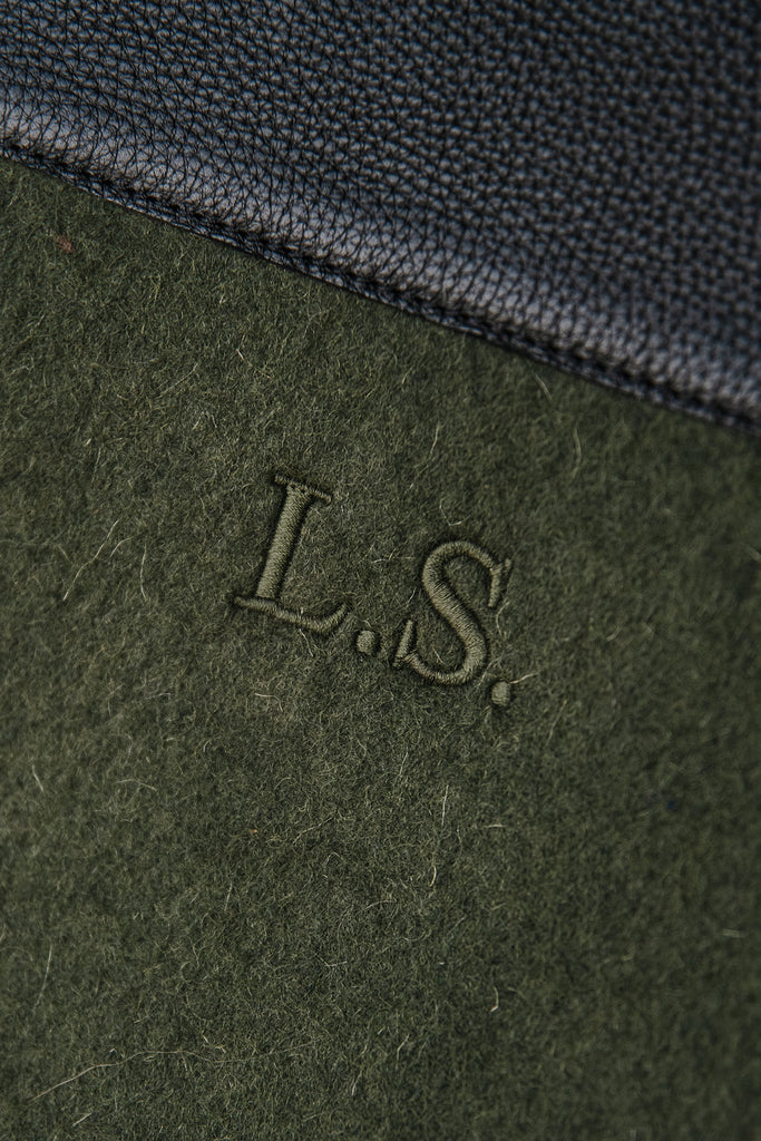the honest wolf wool laptop sleeve forest green lifestyle embroidery