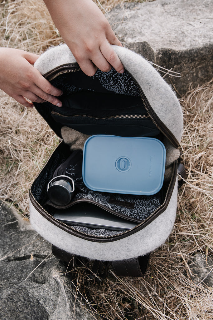 Honest wolf wool backpack in taupe with brown leather lifestyle