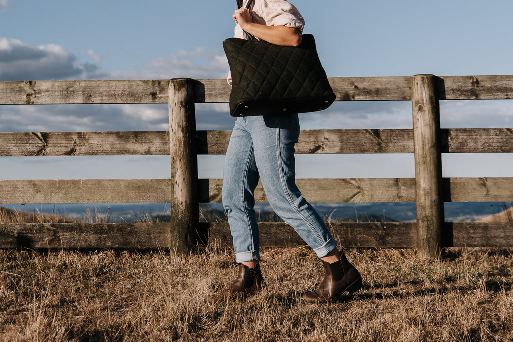 Honest Wolf green quilted mini tote on farm lifestyle