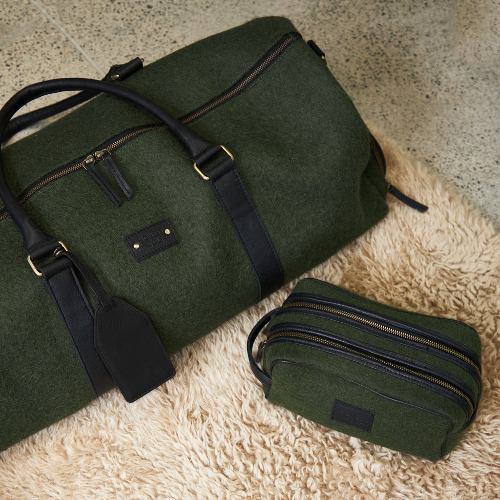 Honest wolf travel pack with the weekender travel tag and wash bag in forest green