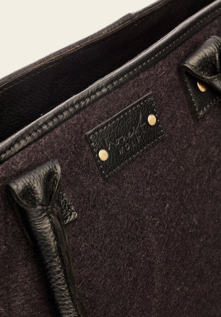 Honest Wolf wool mini tote bag in midnight black product