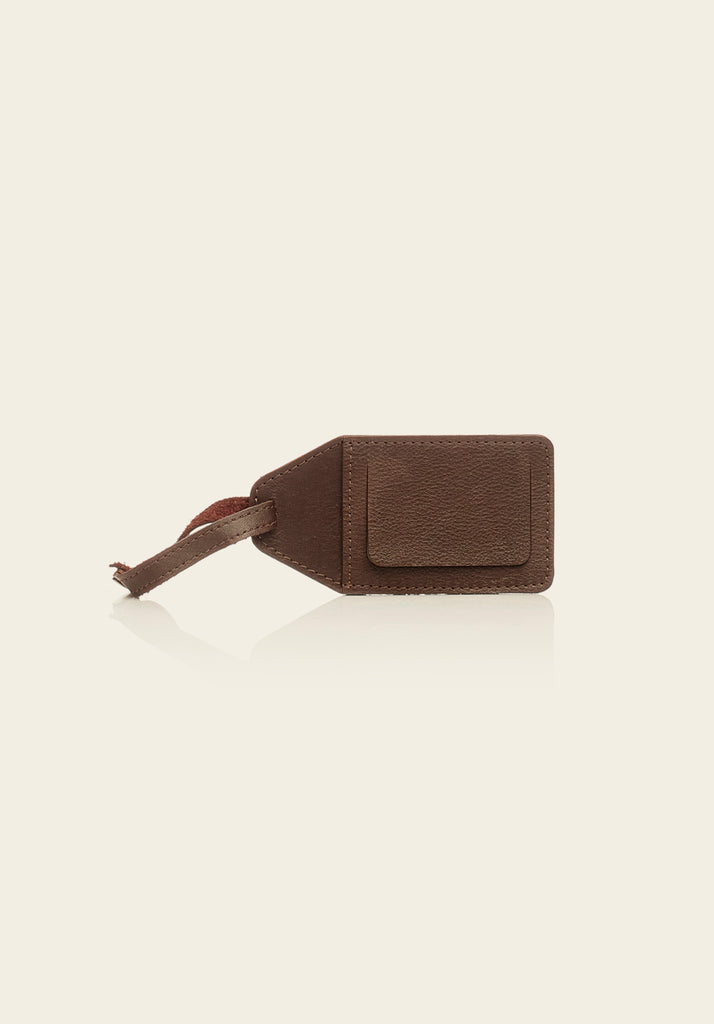 The Overnighter with Luggage Tag - view of back of luggage tag product