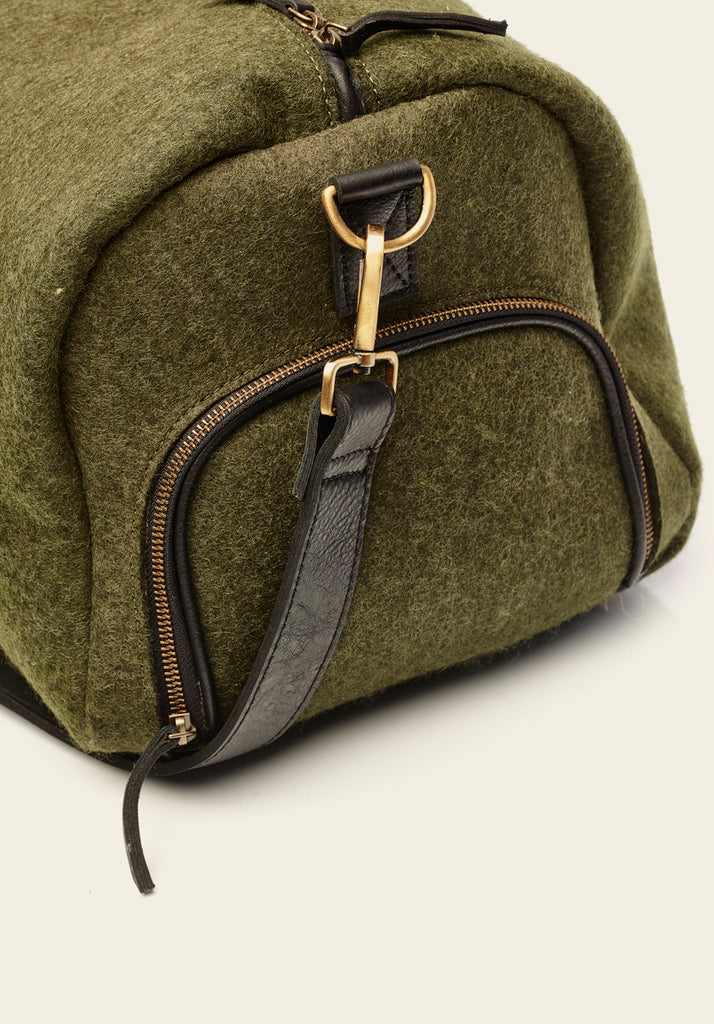 Honest wolf wool weekender travel bag forest green  end of the bag with shoe storage zipped up product