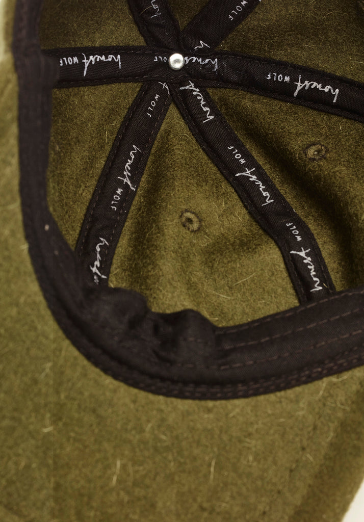 honest wolf The Wool Cap - Moss green  - inside view of finishing detail product