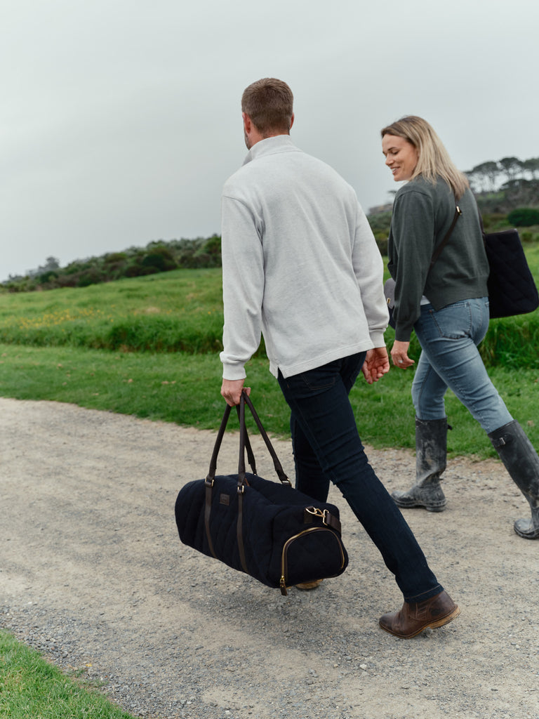 honest wolf wool navy quilted weekend bag lifestyle
