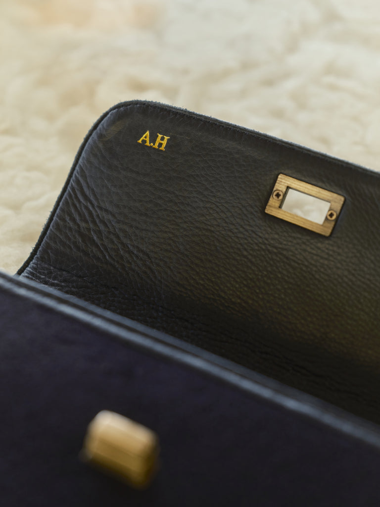 Honest Wolf crossbody embossing