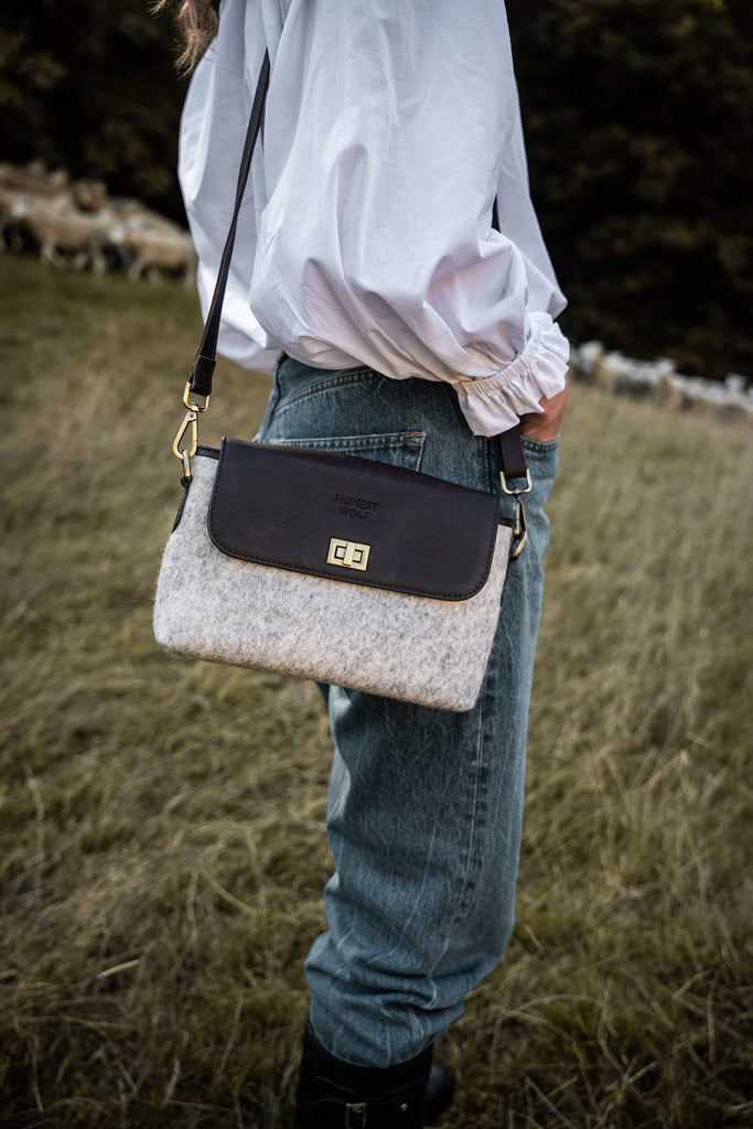honest wolf taupe grey wool crossbody lifestyle