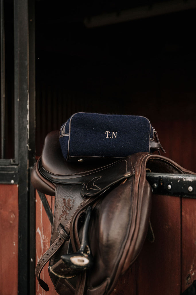 the honest wolf wool wash bag gold on navy embroidery