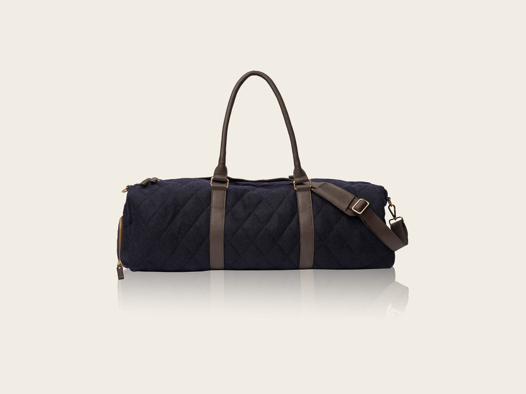 honest wolf wool navy quilted weekend bag  product