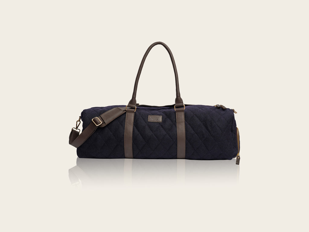 honest wolf wool navy quilted weekend bag  product