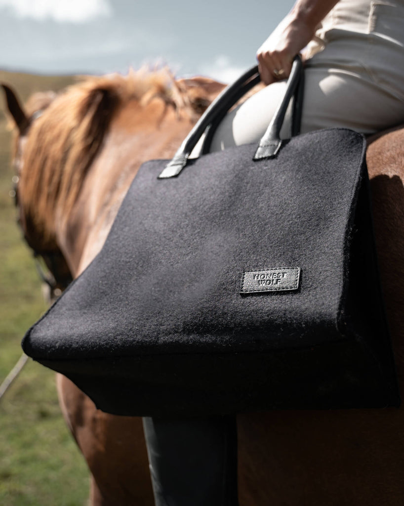honest wolf black wool everyday tote bag lifestyle
