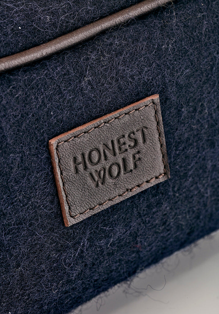 honest wolf wool wash bag navy with brown leather product