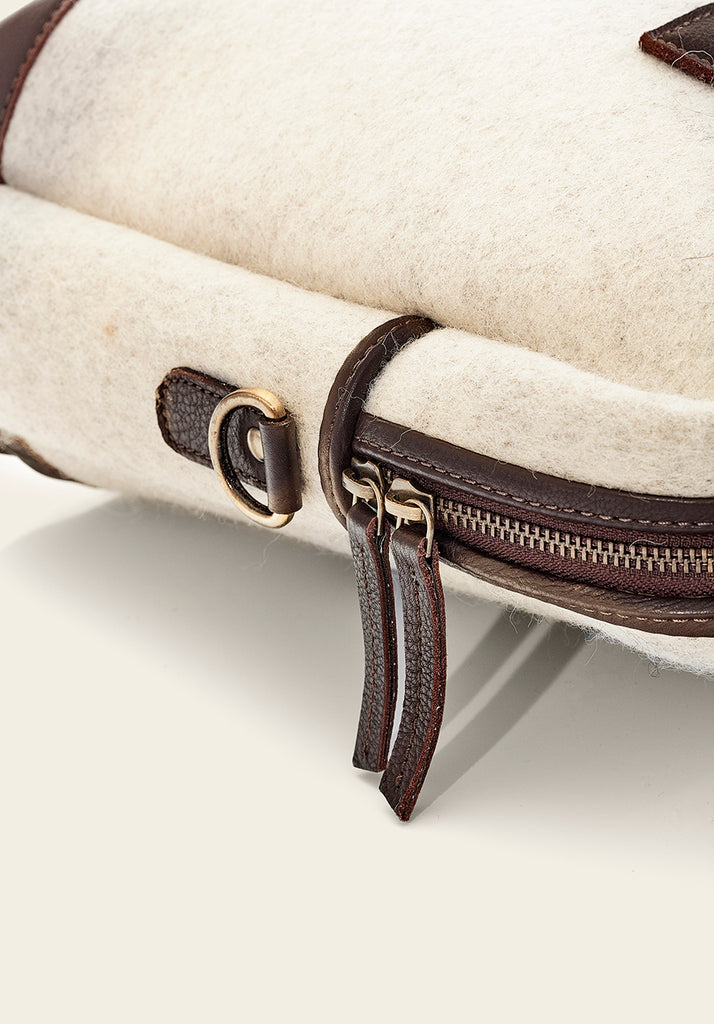 Honest wolf wool Satchel - Taupe, a view of the zip detail on side of the bag product 
