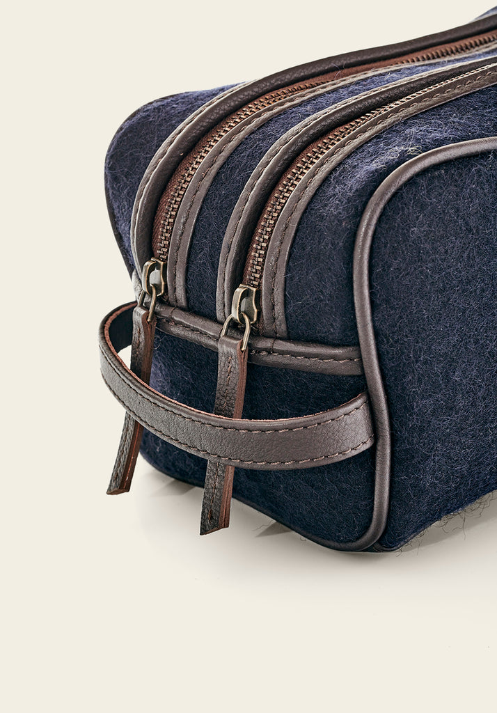 honest wolf wool wash bag navy with brown leather product 