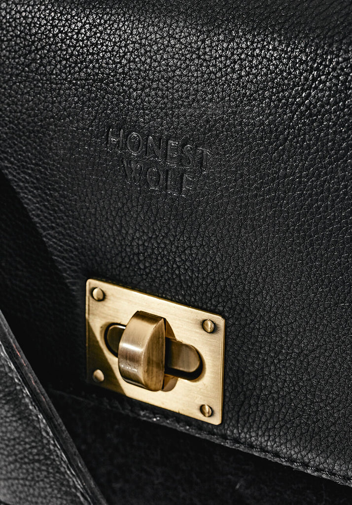 The Briefcase - Midnight - close up detail of clasp and logo